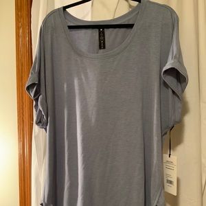 Yogalicious light blue/grey T-shirt. Size 2X. NEW. Folded short sleeves